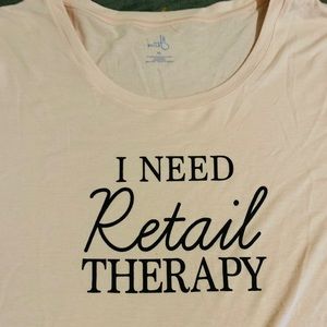 Women’s graphic tee says retail therapy size xl